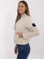 Hurt Beżowa pikowana kurtka bamberka ze stójką  