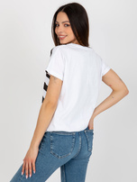 Hurt Biało-czarna damska bluzka w paski z kwiatem 