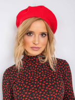Czerwony dzianinowy beret z pomponem