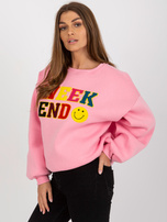 Hurtownia Różowa dresowa bluza bez kaptura z napisem