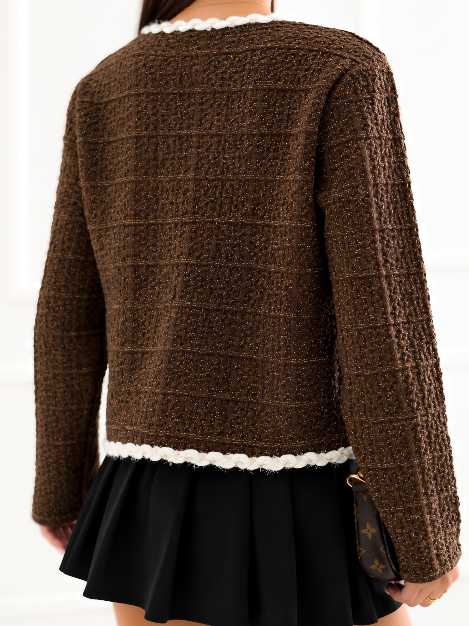 Brown elegant cardigan in a structured weave.
