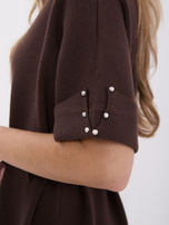 Chocolate knitted dress with short sleeves.