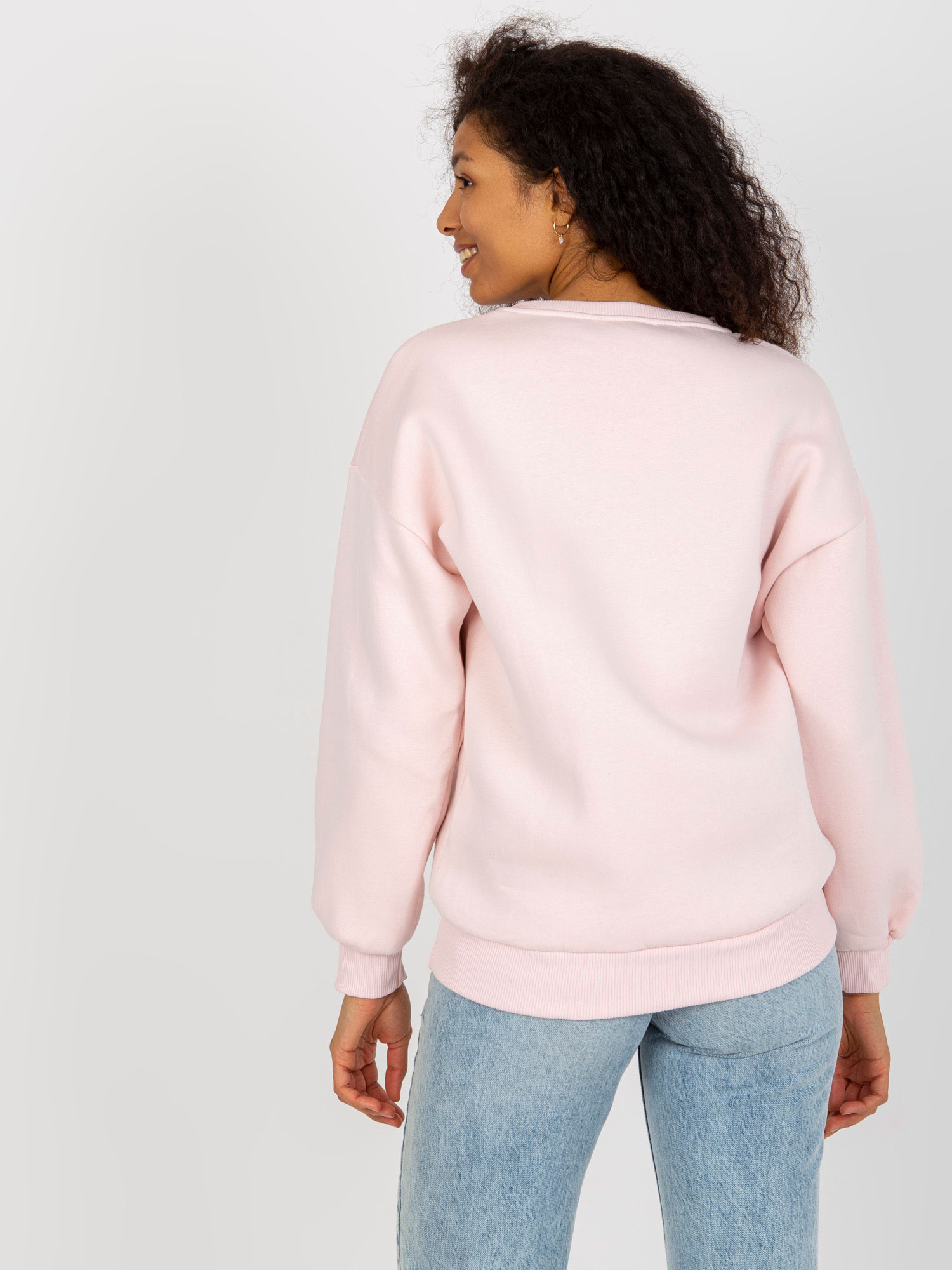 Hurt Jasnoróżowa dresowa bluza oversize z nadrukiem  