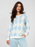 Pastel blue sweatshirt with geometric patterns.