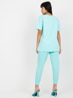 Hurtownia online Miętowy luźny t-shirt z nadrukiem