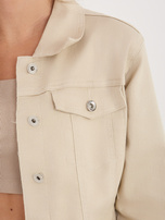 Beżowa jeansowa kurtka o dopasowanym kroju