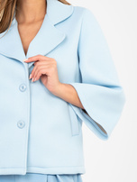 Pastelowy niebieski piankowy płaszcz z kieszeniami