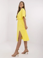 Yellow summer women's dress made of muslin.