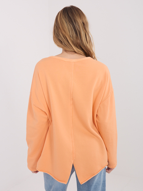 Jasnopomarańczowa bluza oversize bez kaptura