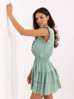 Minikleid in Mint mit Rüsche.