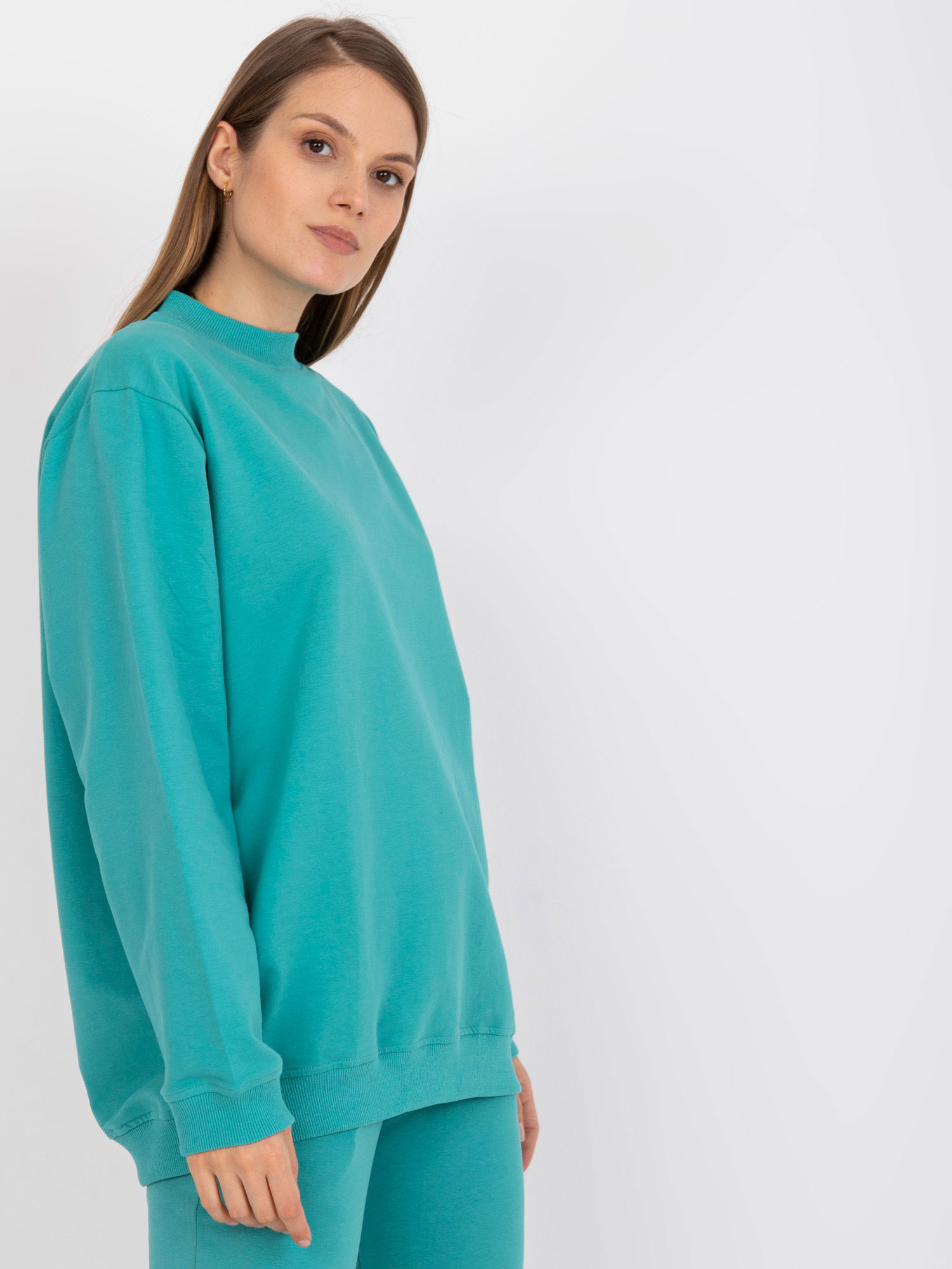 Turquoise basic sweatshirt in an oversized fit.