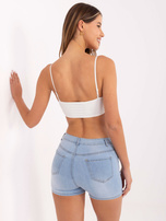 Niebieskie dopasowane szorty jeansowe