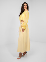Pastelowa żółta spódnica z ozdobnym guzikiem