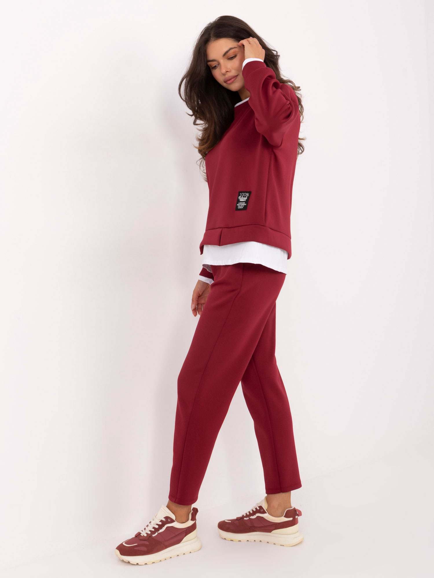 Burgundy women's set with pants.