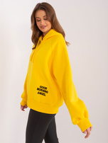 Hurtownia Żółta ocieplana bluza oversize z kapturem i napisem