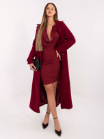 Burgundy mini dress with a decorative necklace.