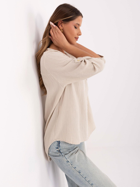 Hurtownia Beżowa muślinowa bluzka z dekoltem V