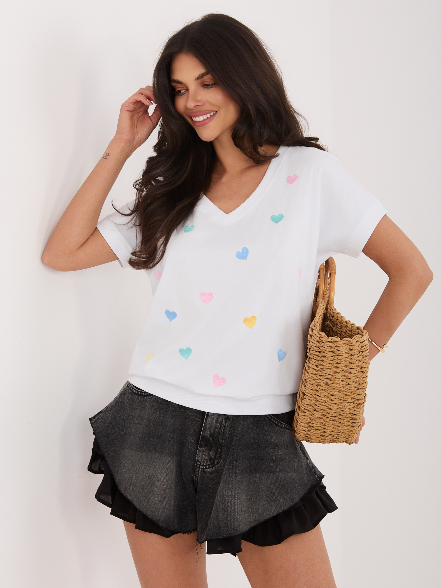 White cotton short-sleeved blouse.