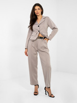 Sweatpants with decorative buttons.