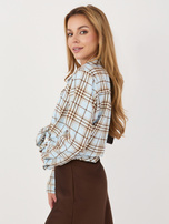 Jasnoniebieska damska koszula oversize w kratę