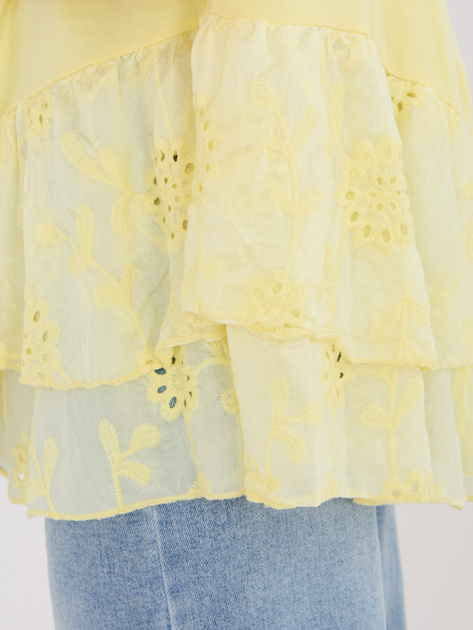 Jasnożółta rozkloszowana bluzka z haftem
