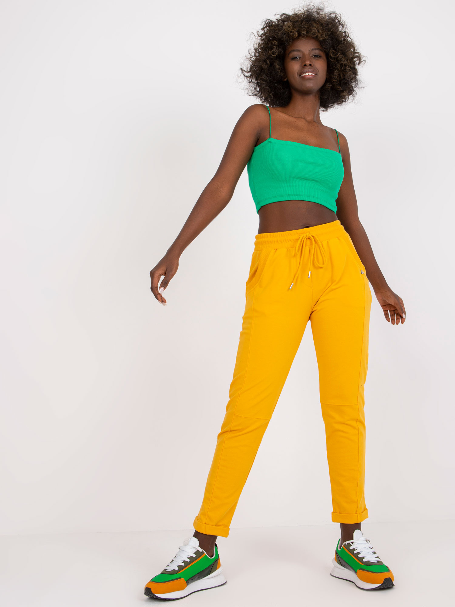 Bright orange basic sweatpants with pockets.