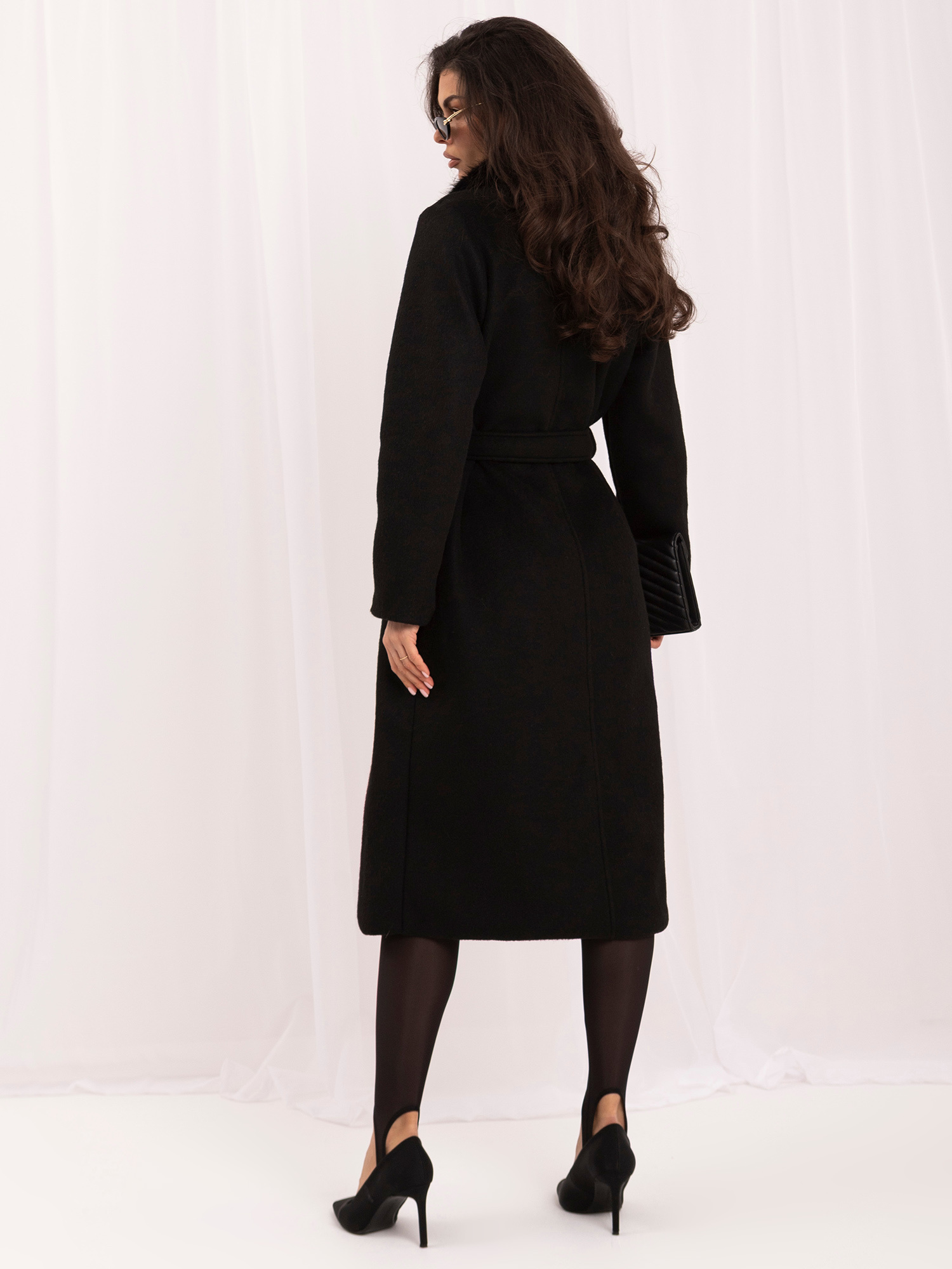 Black double-breasted coat with a wool blend.