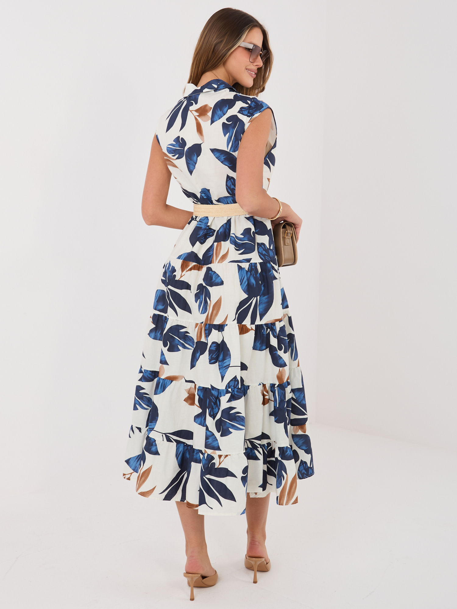 Navy blue shirt dress with a floral pattern.