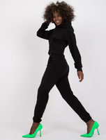 Črn kompleti dres z žepi Neele.