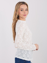 White transparent lace blouse.