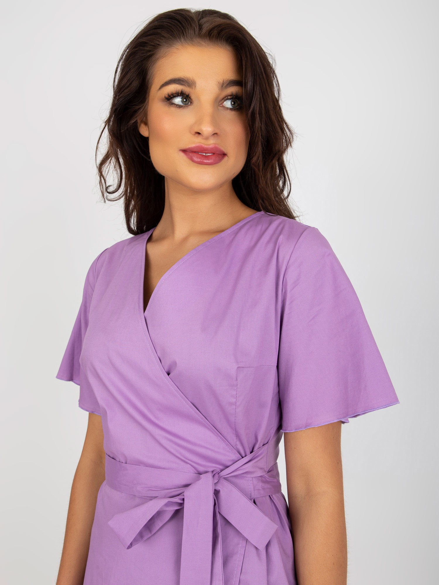 Wholesale light purple flared dress with a ruffle.