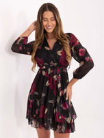 Black mini dress with a ruffle.
