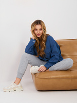 Niebieska jeansowa koszula ze ściągaczem na dole