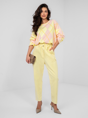 Pastelowe żółte sztruksowe spodnie z kieszeniami 