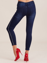 Ciemnoniebieskie jeansy z lampasami
