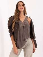Dark beige women's top with a worn effect.