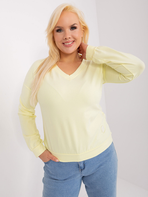 Hurtownia Jasnożółta bluzka plus size z naszywką
