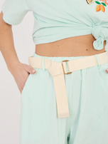 Miętowe damskie spodnie straight leg z kieszeniami