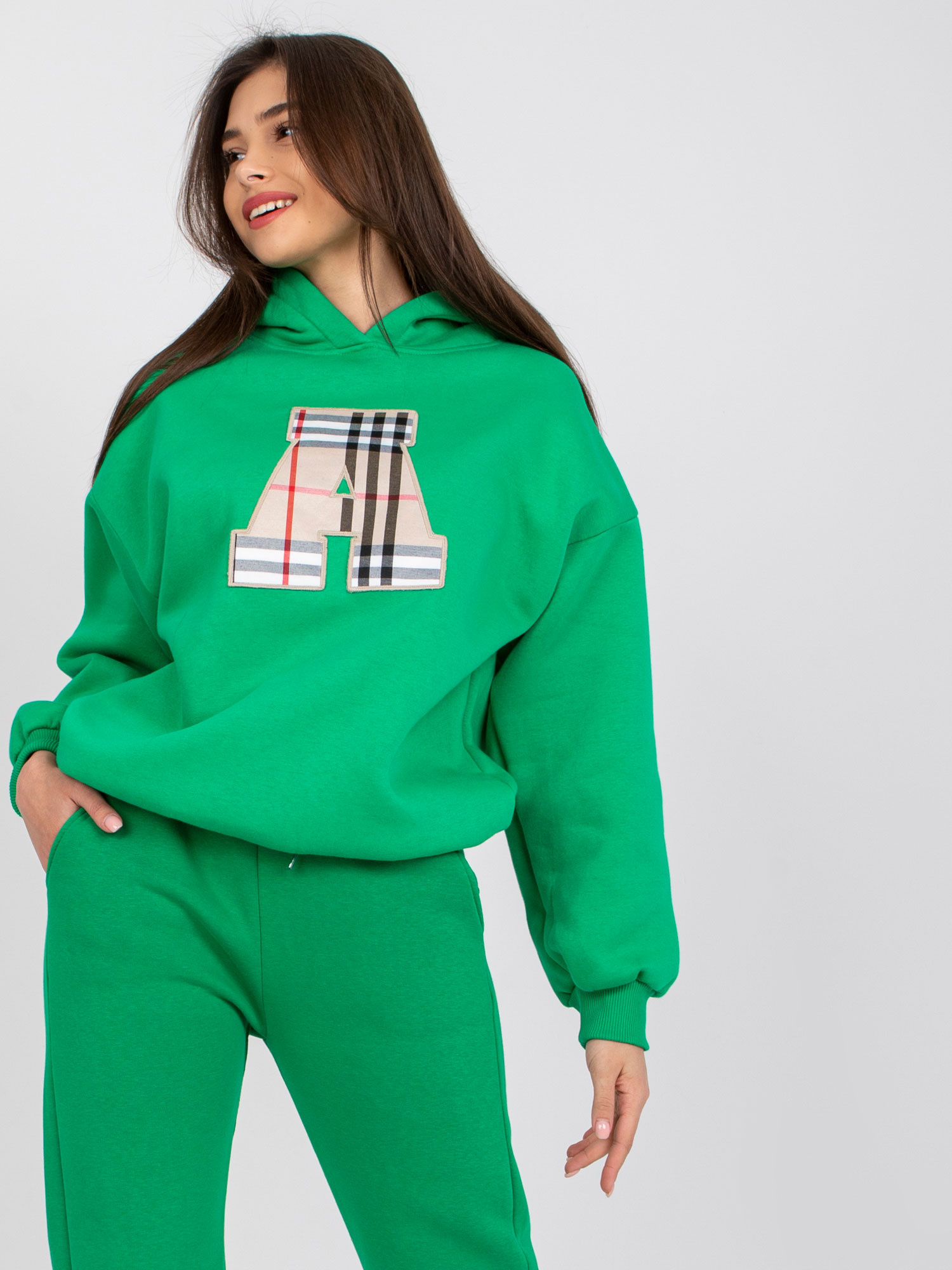 Green sweatshirt with patch and hood Felicja