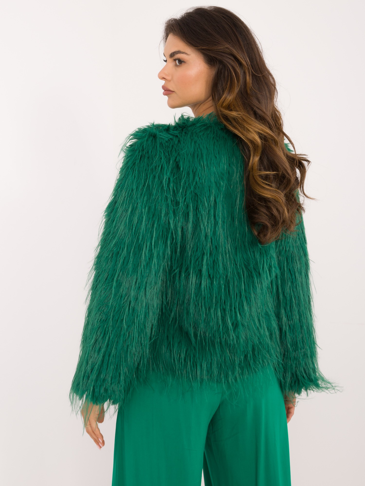 Hurt green women's fur jacket fastened with hooks.