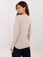 Beżowa bluzka longsleeve z naszywką na plecach