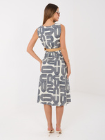 Navy blue flared sleeveless dress.