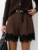 Dark brown elegant shorts with wide legs.
