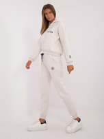 Hurtownia Jasnobeżowy melanżowy komplet dresowy z bluzą