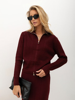 Burgundy knitted set with a cable knit sweater.