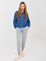 Niebieska jeansowa koszula ze ściągaczem na dole