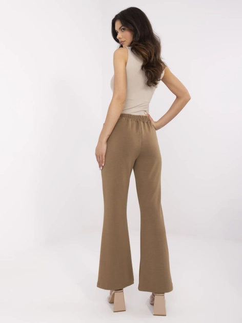 Jasnobrązowe dresowe spodnie dzwony z broszkami