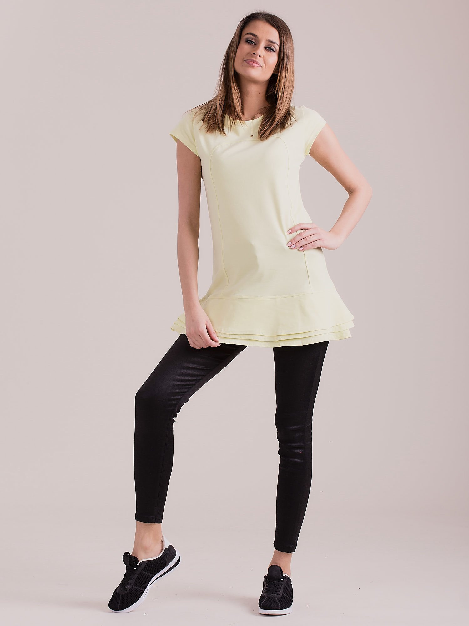 Light yellow tunic with layered ruffles