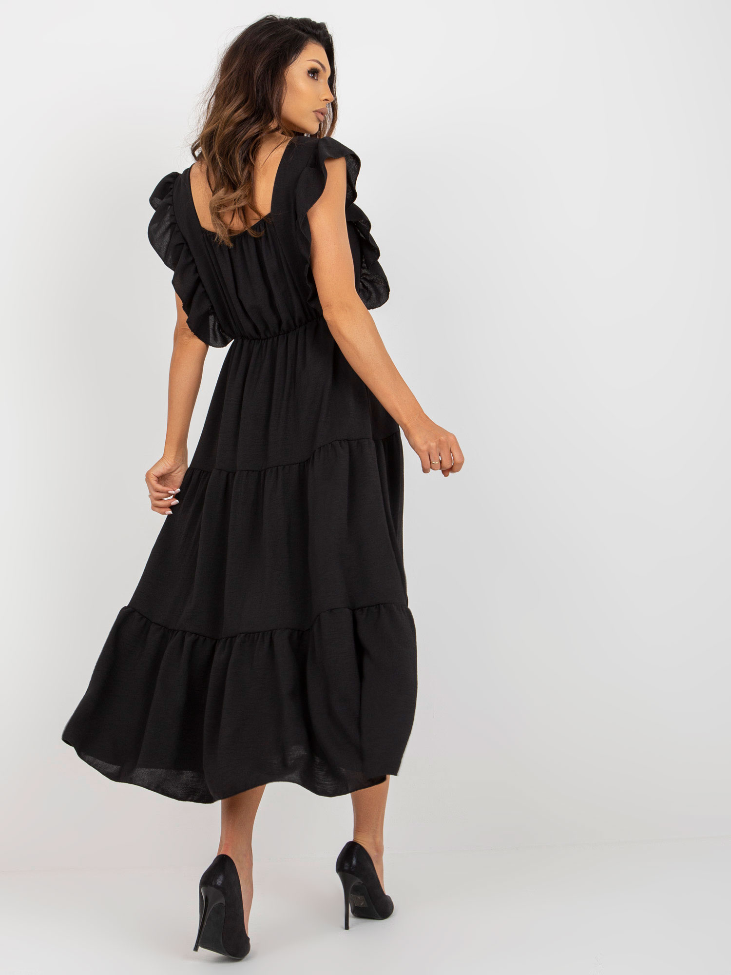 Hurt Black midi dress with a ruffle in a loose fit.