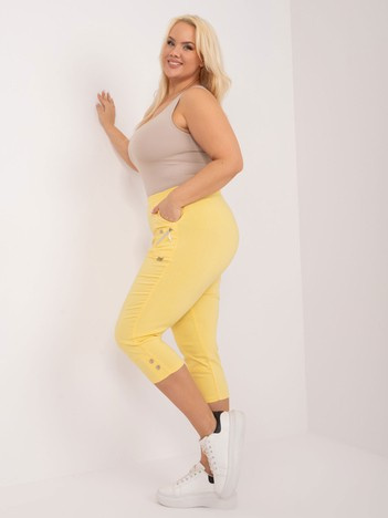 Hurt Jasnożółte spodnie 3/4 plus size z materiału